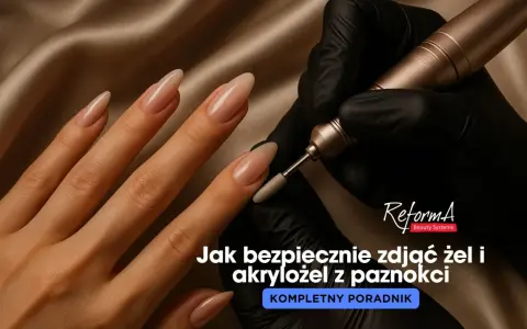 Dłoń z długimi paznokciami żelowymi, na których widać frezarkę. Dowiedz się, jak zdjąć paznokcie żelowe bezpiecznie i skutecznie.