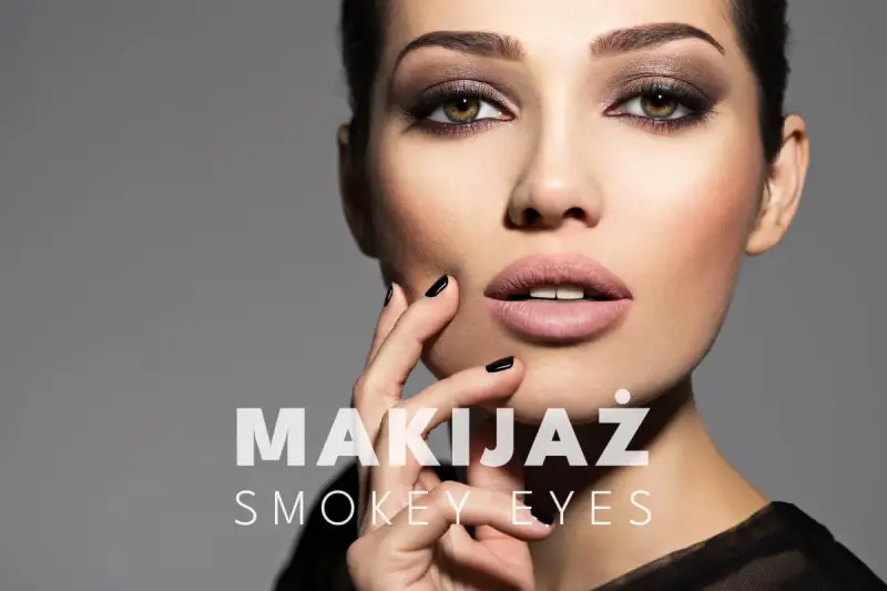 Kobieta z perfekcyjnym makijażem smoky eyes, podkreślonymi brązami i czarną kreską. Usta w cielistym kolorze, paznokcie czarne.